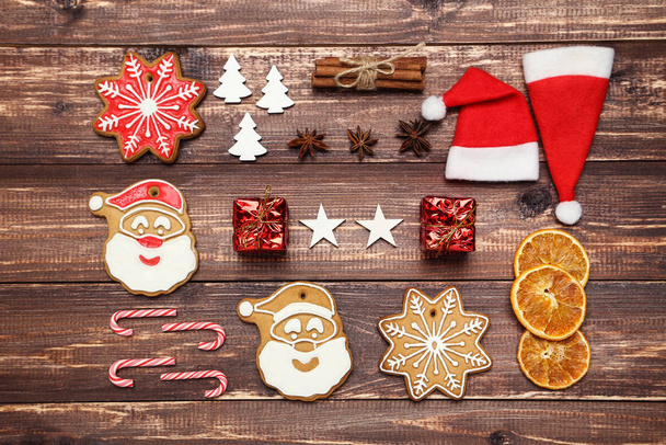 Christmas gingerbread cookies with ornaments, candies and dry or - Fotó, kép