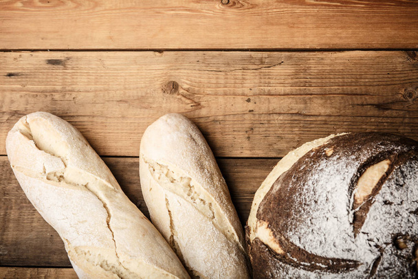 homemade bread with flour and grain - 写真・画像
