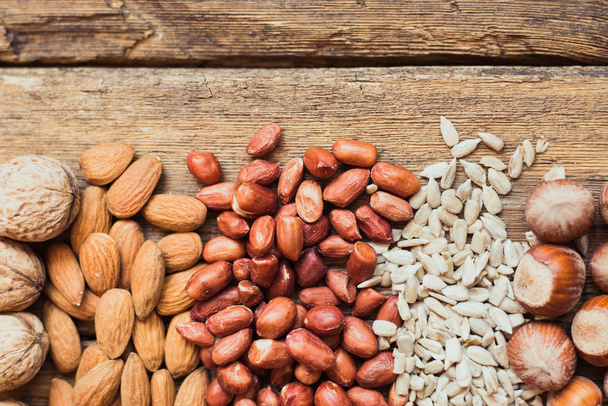 Mix of nuts Almonds, walnuts, peanuts, hazelnuts , sunflower seeds - Zdjęcie, obraz