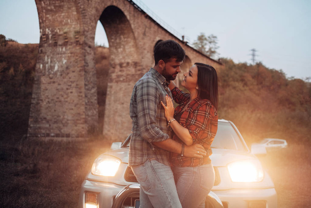 Happy Traveling Couple Together Enjoying Road Trip, Vacation Concept, Holidays Outside the City, Two Cheerful People - Photo, Image