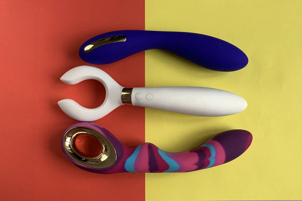 Three vibrators. Three sex toys on bright background. Useful for sex shop or adults - Photo, Image