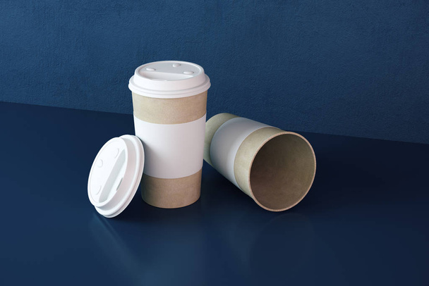 Three disposable coffee cups on table - Фото, изображение