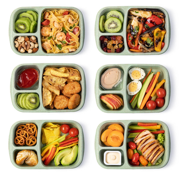 Обеденная коробка с вкусной едой на белом фоне
 - Фото, изображение