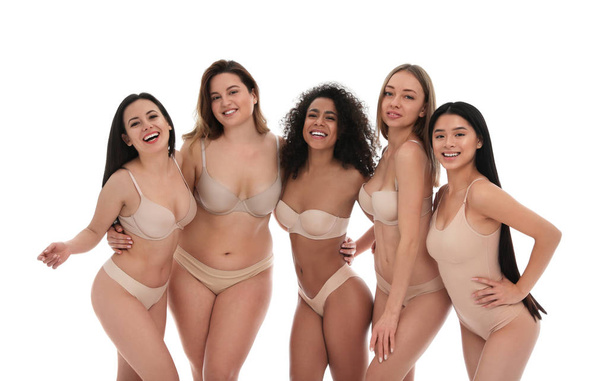 Group of women with different body types in underwear on white background - 写真・画像