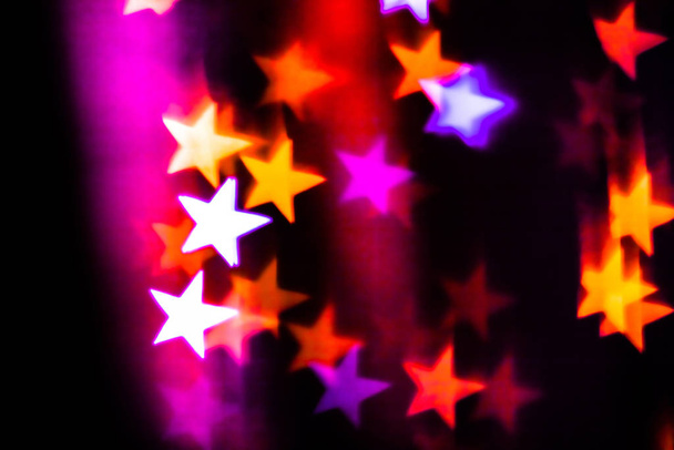 Colorful stars bokeh background - 写真・画像