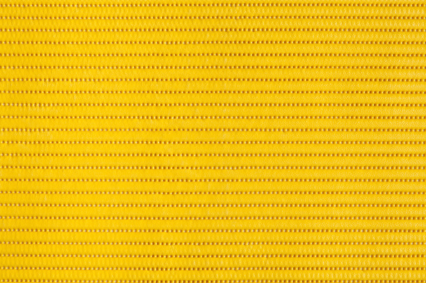 Sárga műanyag holey háttér - Fotó, kép