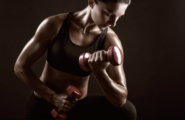fitness nő súlyzórúdhoz  - Fotó, kép