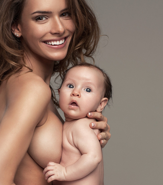 Portrait of beautiful woman with baby - Zdjęcie, obraz
