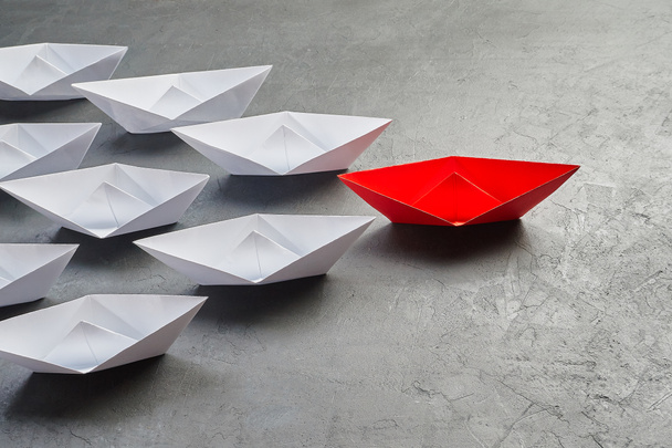 Business Concept, Paper Boat, the key opinion Leader, the concept of influence. - Photo, Image