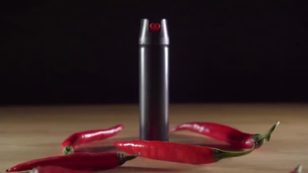 black pepper spray bottle on the table - Séquence, vidéo