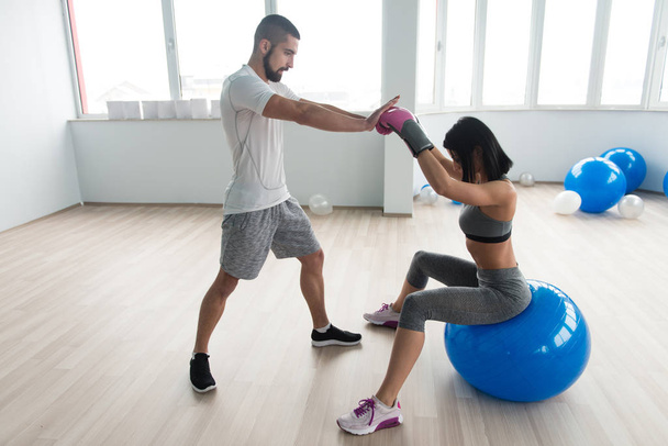 Woman Fighter With Personal Trainer In Gym - Zdjęcie, obraz