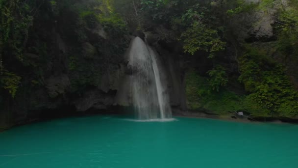 Kawasan Falls in a mountain gorge at the tropical jungle of Cebu Island in Philippines. Waterfall landscape and green tropic nature in Asia - Footage, Video
