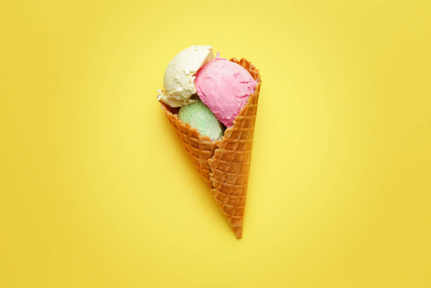 Sweet tasty ice-cream on color background - Fotografie, Obrázek