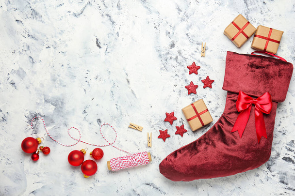 Christmas sock with gifts on white background - Photo, Image