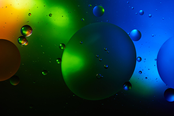 sfondo astratto da acqua mista e olio in colore verde e blu
 - Foto, immagini