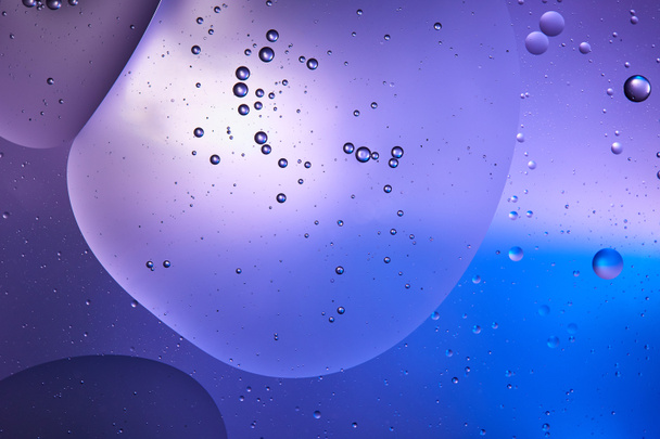 Beautiful abstract blue and purple color background from mixed water and oil  - Foto, afbeelding