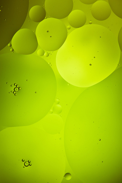 Beautiful green color abstract background from mixed water and oil - Photo, Image