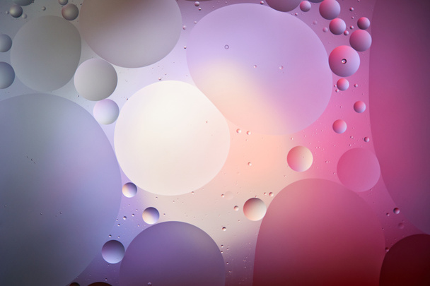 creative purple and pink color texture from mixed water and oil bubbles - Photo, Image