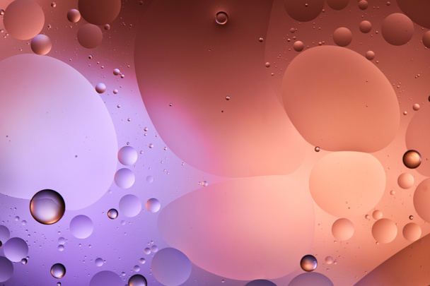 abstract purple and pink color texture from mixed water and oil bubbles - Fotoğraf, Görsel