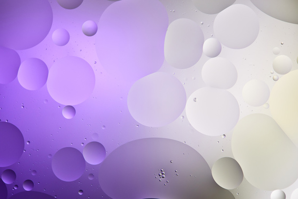abstract purple and grey color texture from mixed water and oil bubbles - Foto, afbeelding