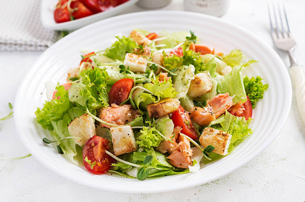 Caesar Salad with Salmon. Fish menu. Seafood - salmon. - Photo, Image