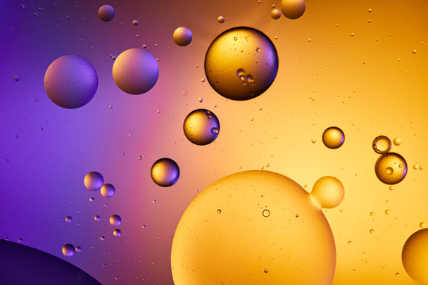 orange and purple color abstract background from mixed water and oil  - Photo, Image
