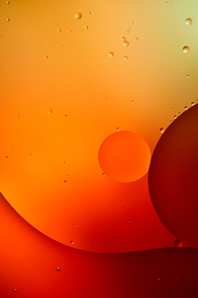 orange and red color abstract background from mixed water and oil  - Foto, afbeelding