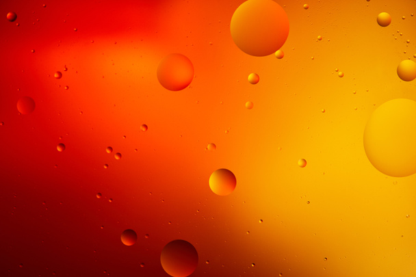 abstract macro orange and red color background from mixed water and oil  - Foto, imagen