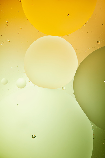 Bellissimo sfondo astratto di colore verde e arancione da acqua e olio misti
 - Foto, immagini