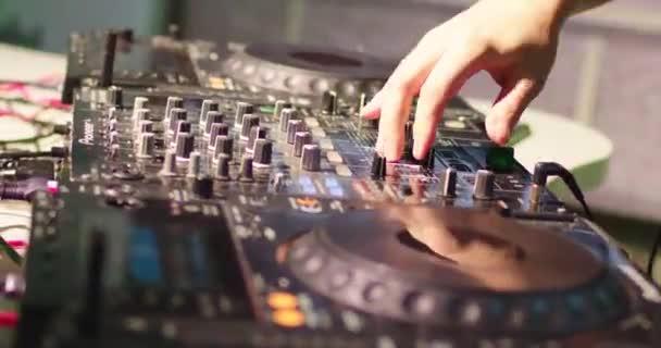 Dj mixes the track in nightclub at party - Footage, Video