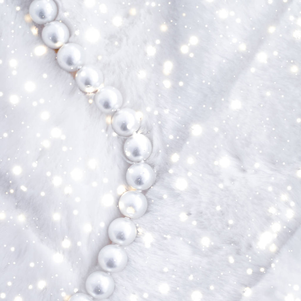 Winter holiday jewellery fashion, pearl necklace on fur backgrou - Photo, Image