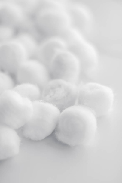 Organic cotton balls background for morning routine, spa cosmeti - Фото, изображение