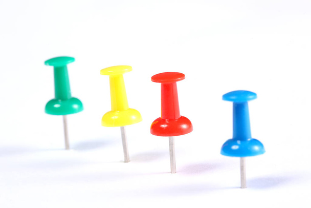 line of push pins isolated on white background with copy space for your text - Photo, Image