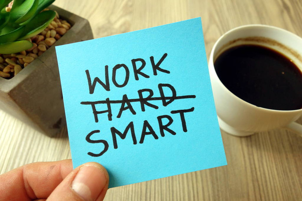 Work smart - motivational reminder handwritten on sticky note - Photo, Image