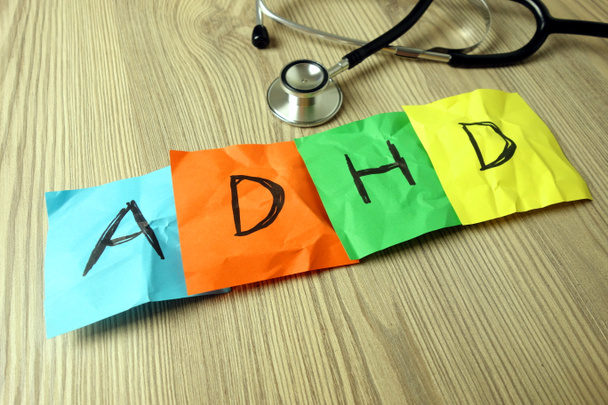 ADHD Attention Deficit Hyperactivity Disorder abbreviation handwritten on sticky notes - Photo, Image