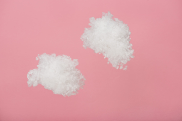 white fluffy clouds made of cotton wool isolated on pink - Valokuva, kuva