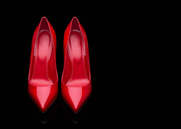 A pair of red women's shoes with high heels. - Photo, Image