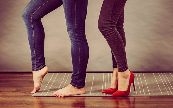 Women legs barefoot and in high heels - Фото, изображение