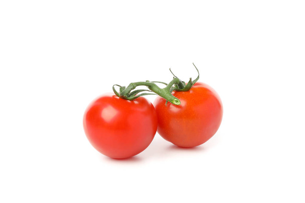 Tasty red tomatoes isolated on white background - 写真・画像