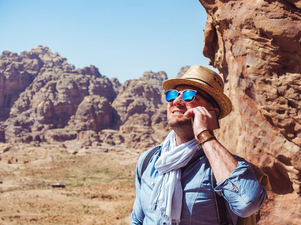 Handsome man, exploring the sights of of Petra - Photo, Image