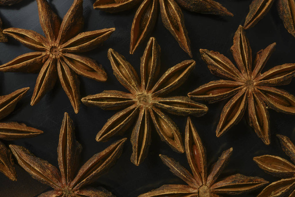 star anise on black background closeup - Φωτογραφία, εικόνα