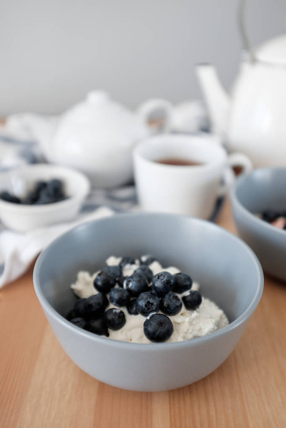 Breakfast with cottage cheese served on table - Photo, image