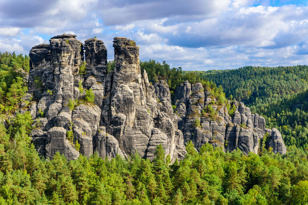 Bastei Rocks in Swiss Saxony, beautiful landscape scenery around the ruins of Neurathen Castle, Elbe Sandstone Mountains in Saxon Switzerland, Germany, Europe. - Fotó, kép