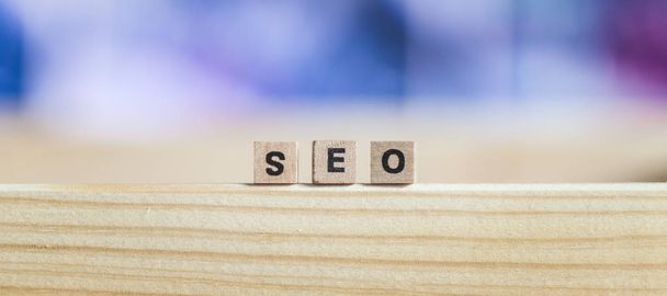 Wood cubes with the word SEO,  with copy space. Search engine optimization. - Fotoğraf, Görsel