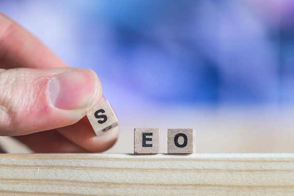 Wood cubes with the word SEO,  picture with copy space. Search engine optimization. - Fotoğraf, Görsel