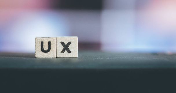 Wood cubes with the word ux,  picture with copy space - Foto, Bild