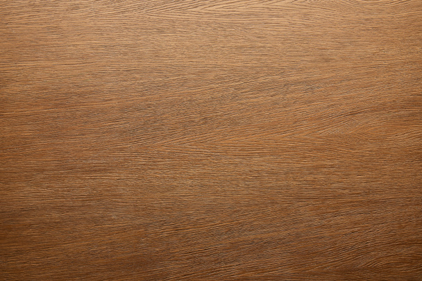 Bovenaanzicht van bruin houten oppervlak  - Foto, afbeelding