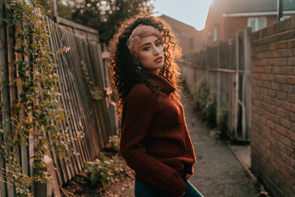 Portrait of Young Brunette Girl with Curly Hair - Photo, Image