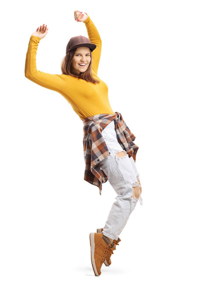 Smiling young female dancing on tiptoes  - Valokuva, kuva