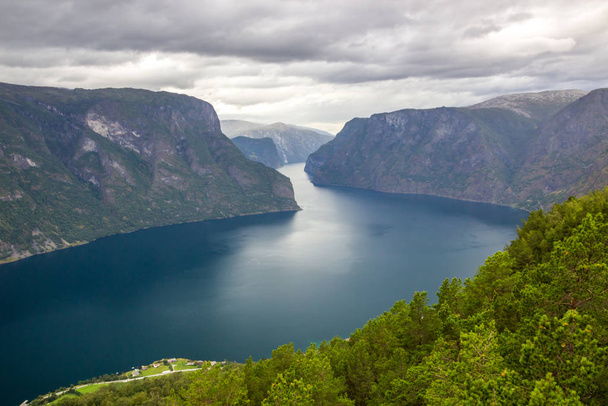 view of the Aurlandsfjord from the Stegastein viewpoint in the mountains of Norway - Фото, зображення